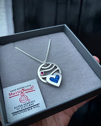 Sterling Silver - Harris Tweed - Ruby Gemstone - approx 20mm with an 18inch chain 