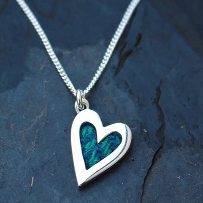 Sterling Silver and Harris Tweed - Approx 18x14mm with an 18inch chain 