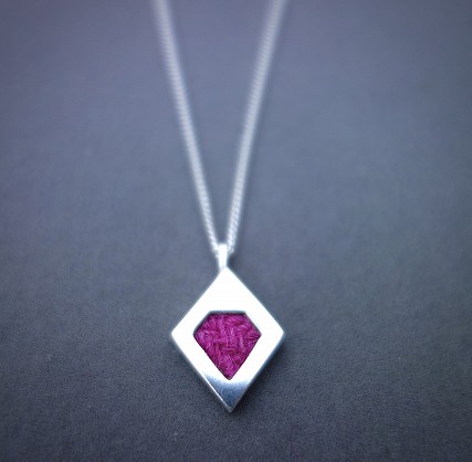 Sterling Silver- Harris Tweed. Approx 14x18mm with an 18inch chain