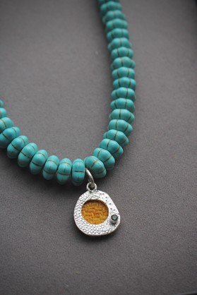 20mm Sterling Silver with Harris Tweed- 18inch, 10x3mm Turquoise Beads and 3mm Teal Sapphire. 
Please note -Turquoise beads will vary slightly as not all strands are the same.
Intro price offer while stocks last. 