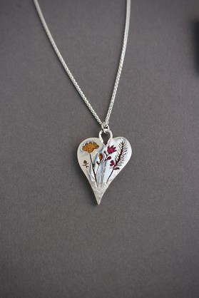 Sterling Silver and Harris Tweed - Approx 30x20mm with an 18inch chain 