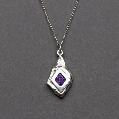 Sterling Silver - Harris Tweed. Approx 25x14mm with an 18inch chain.