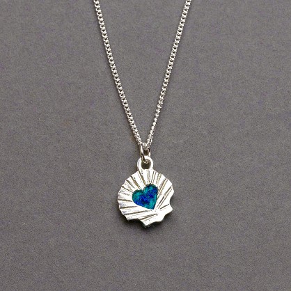 Sterling Silver and Harris Tweed.
Approx 14mm with an 18inch Chain
